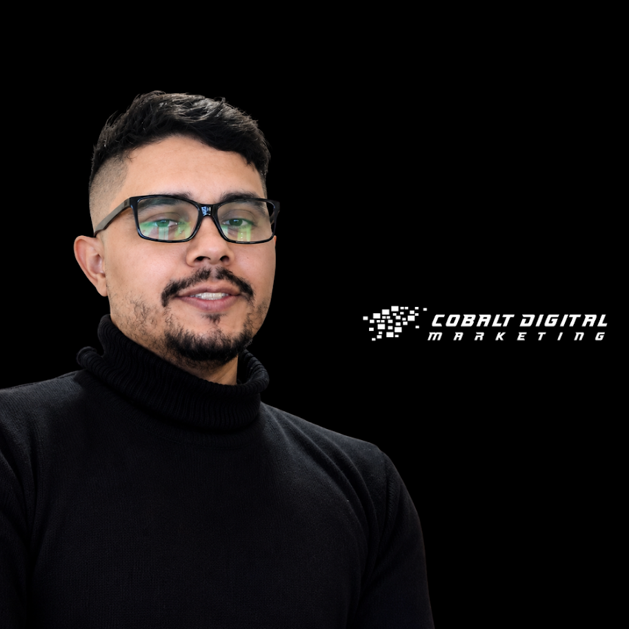 Portrait of a man wearing glasses and a black turtleneck, against a black background with the Cobalt Digital Marketing logo to the right.