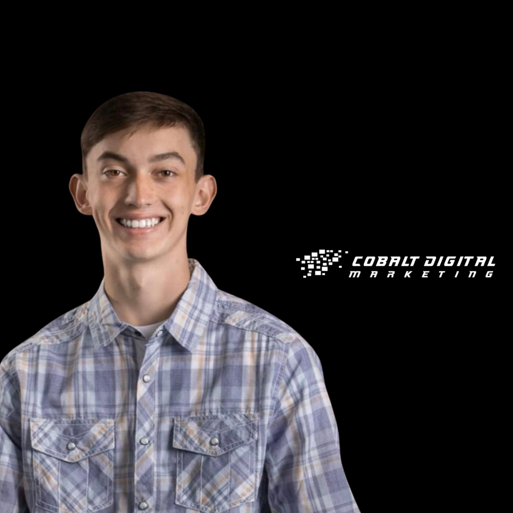Smiling young man in a blue plaid shirt against a black background with Cobalt Digital Marketing logo to the right.
